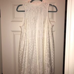 Sleeveless white lace dress